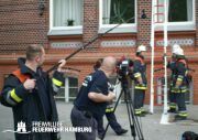 Eine der Szenen zum Schulungsfilm Tragbare Leitern.